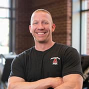 Portrait of personal trainer and wellness coach Aron Layman